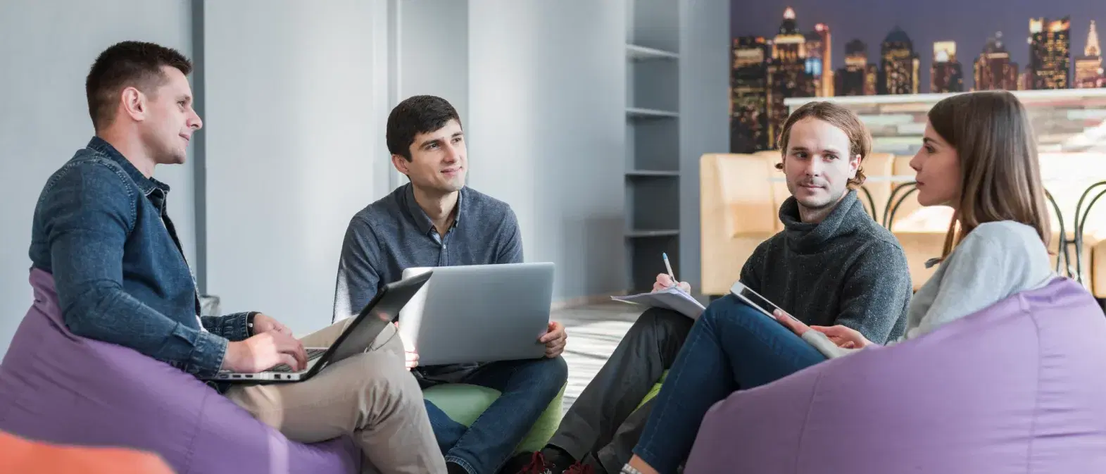 Fluxin.ai team working in a modern marketing studio